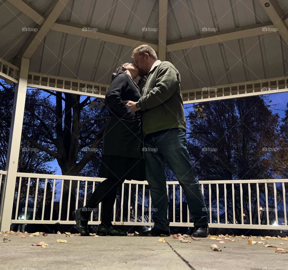 Kissing under the pavilion on our anniversary
