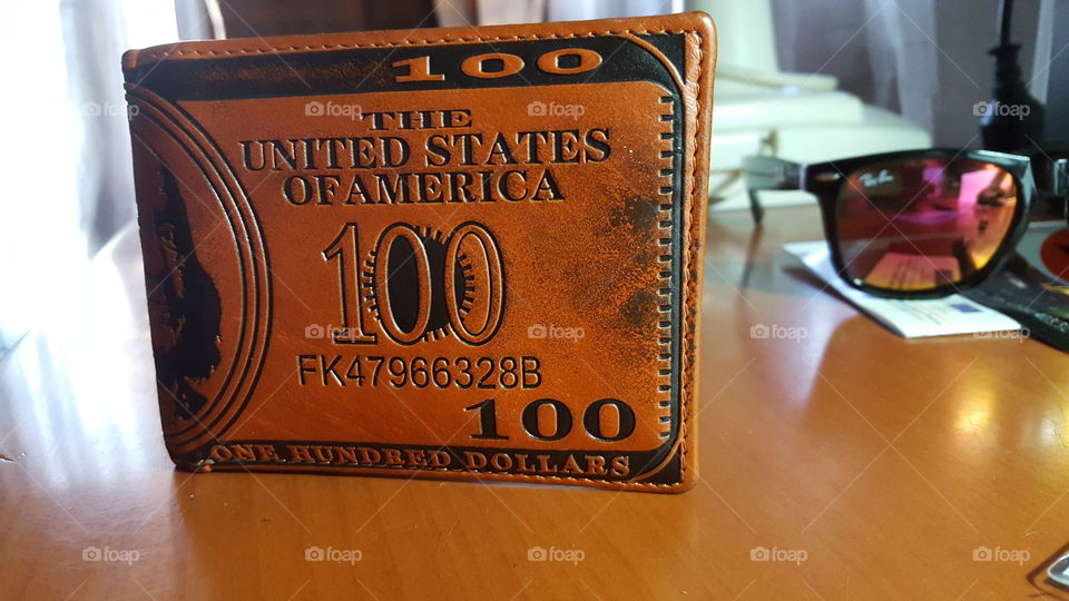 100dollar Wallet. it was a great way of thinking to take this photo with my wallet taken from outside of Europe.hope enjoying it!