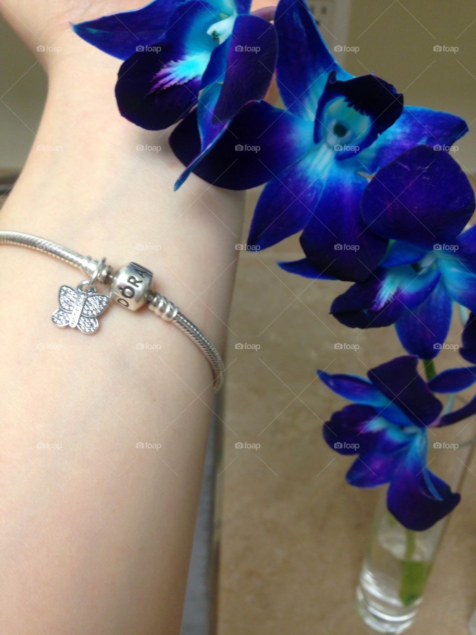 Pandora charm bracelet and blue orchid flower 