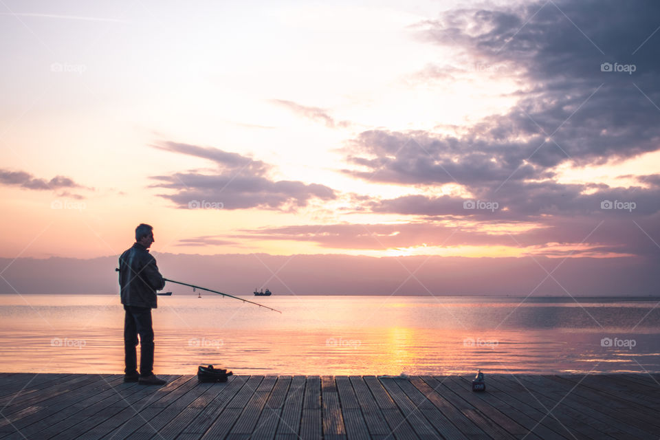 Fisherman In The Sunset
