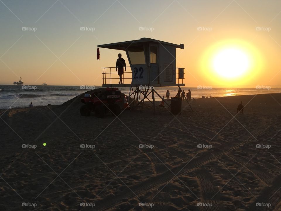 Lifeguard at Sunset. Huntington Beach Sunset