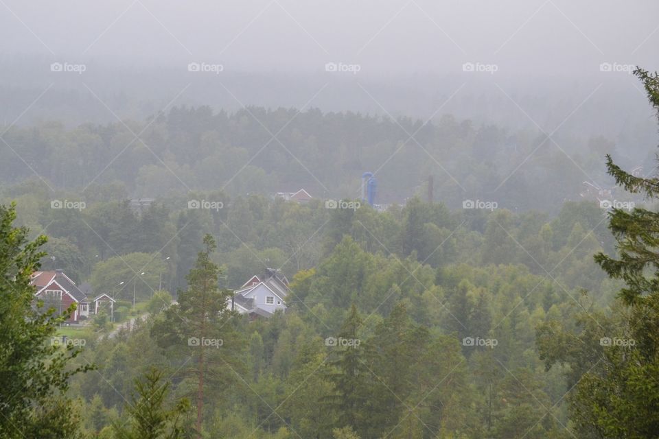 Foggy morning over a small village