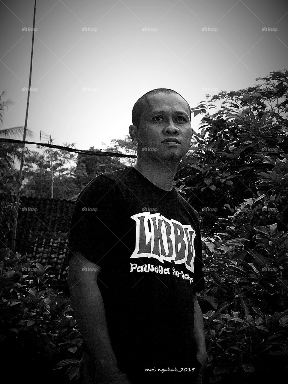 Man standing near trees