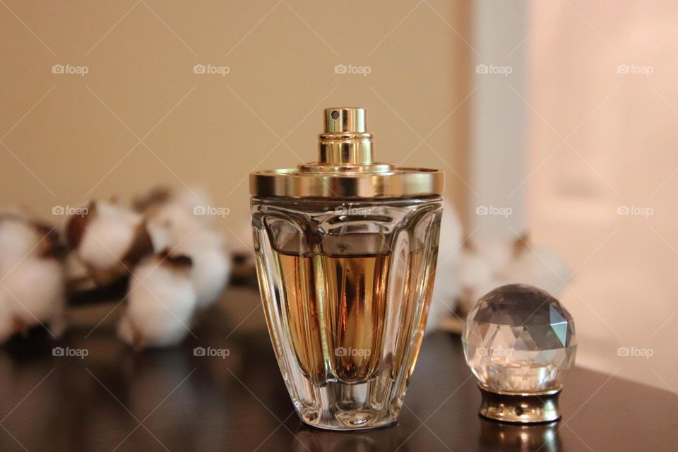 Perfume displayed on dresser