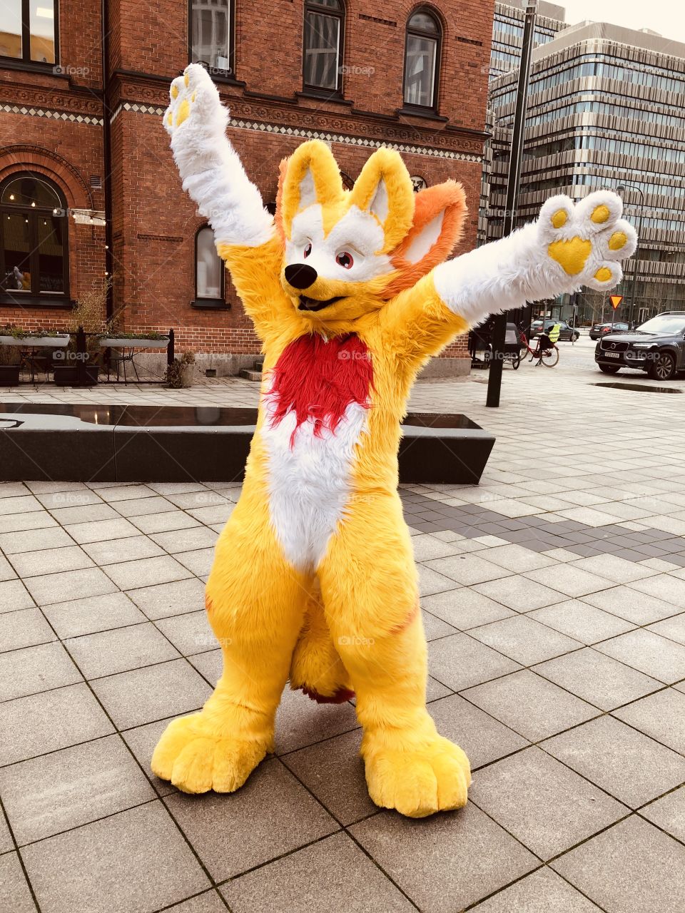 Happy furry mascot giving hugs