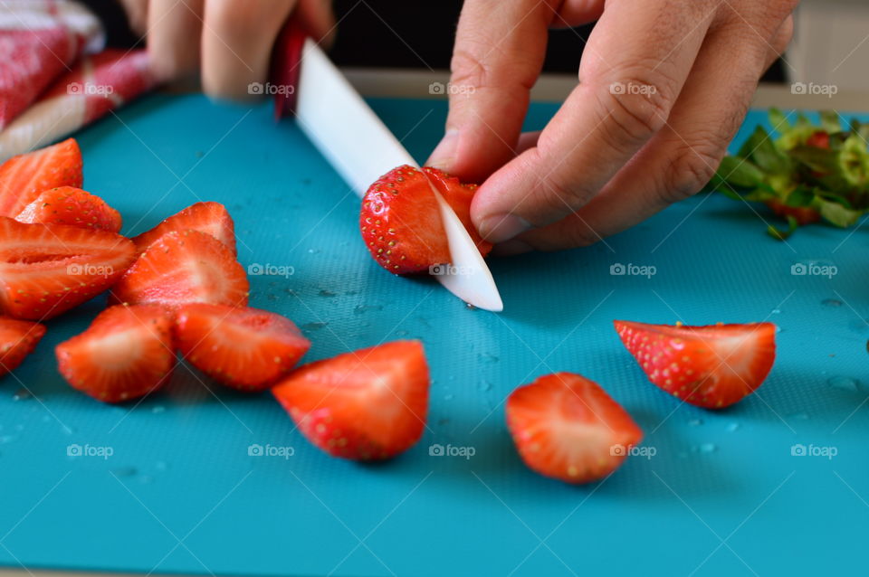 Cutting the strawberries 