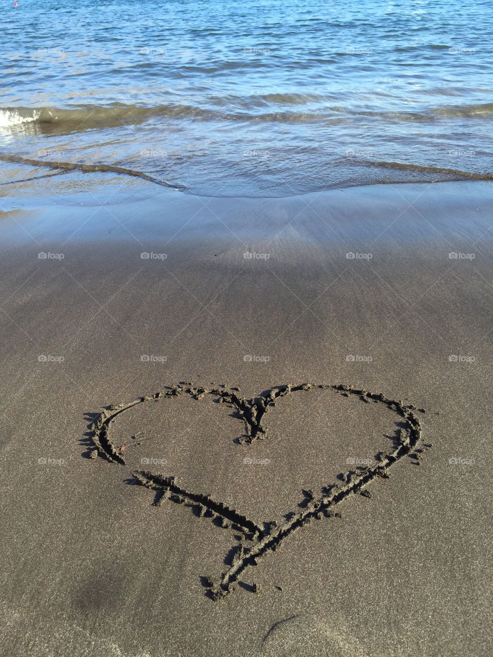 Heart shape made on beach