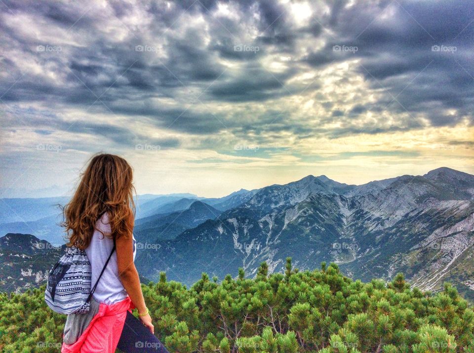 Rear view of woman looking at mountain