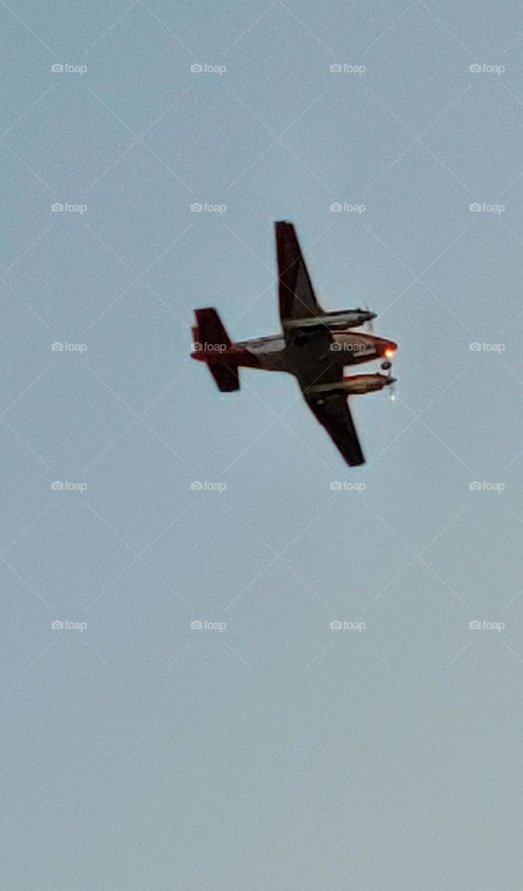 Training plane in the clear, blue Texas sky.