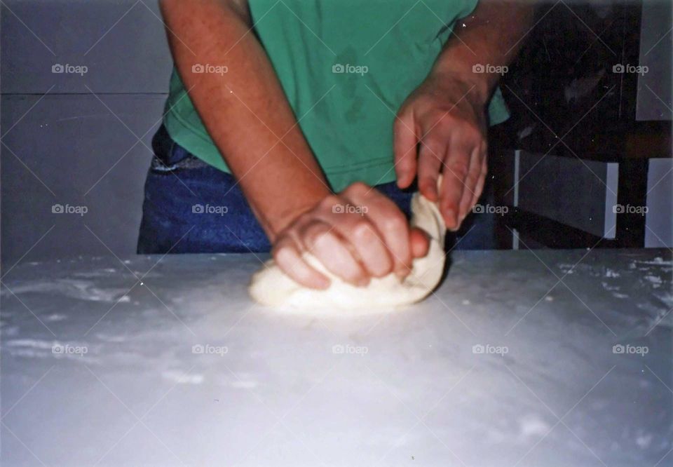 kneading bread dough