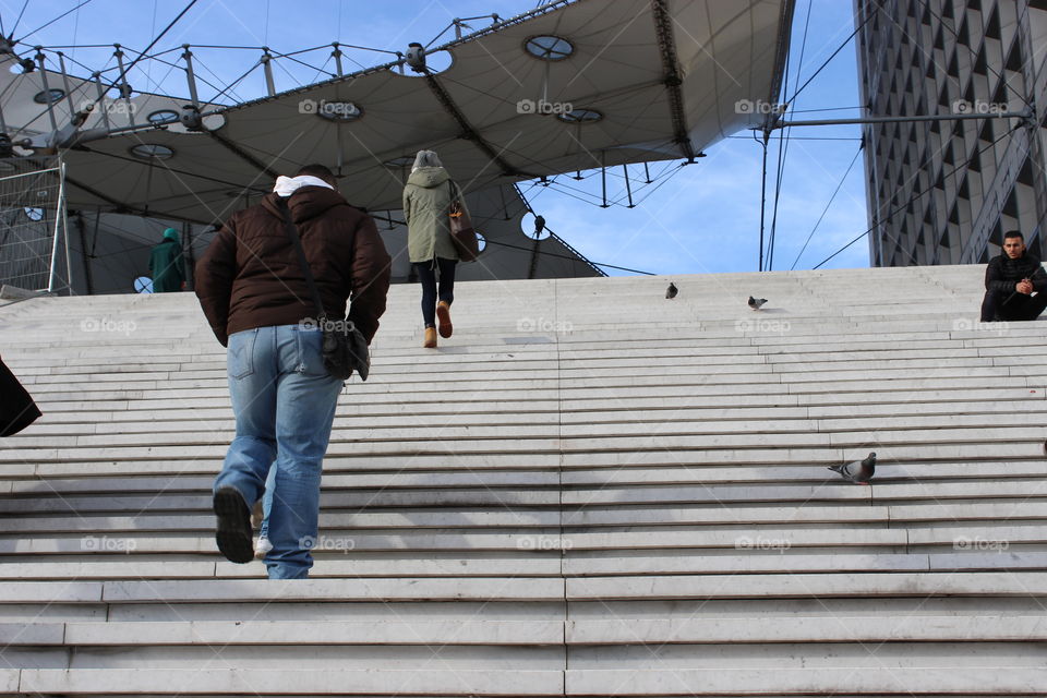 People get on the stairs