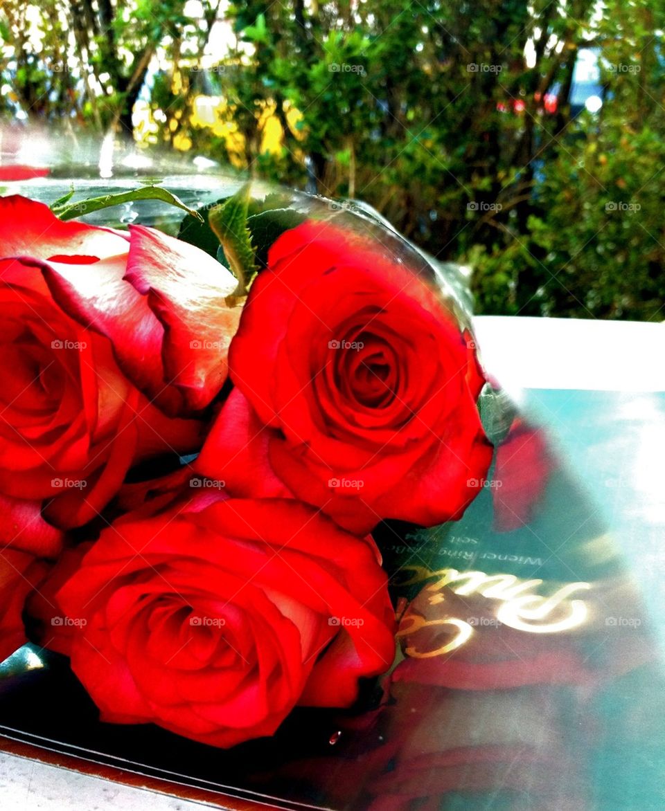 Red roses at the coffetable