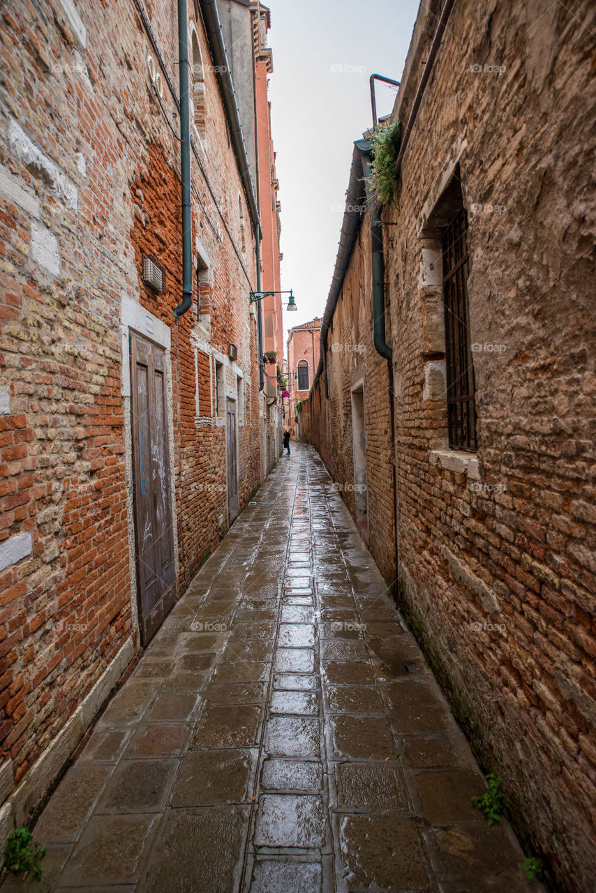 Narrow alley In Venice city