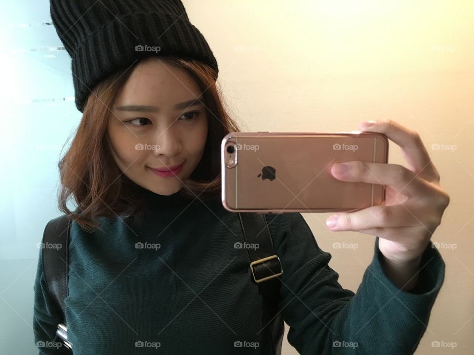 Woman taking selfie form smartphone