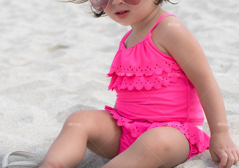 Cute little girl, with pink bikini.