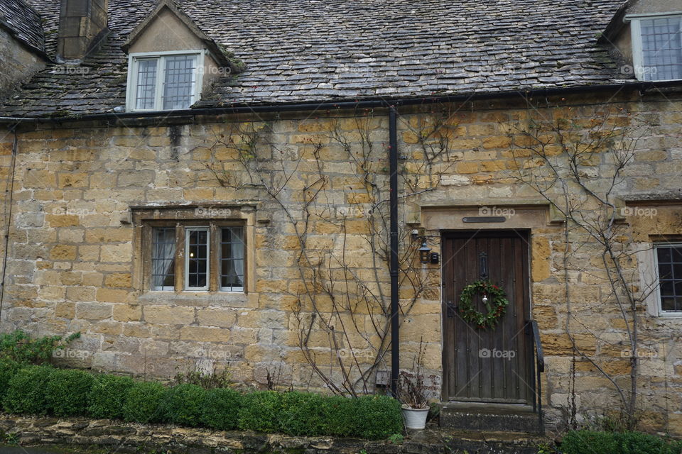 Xmas in the Cotswolds ... Xmas wreath hanging on a front door 