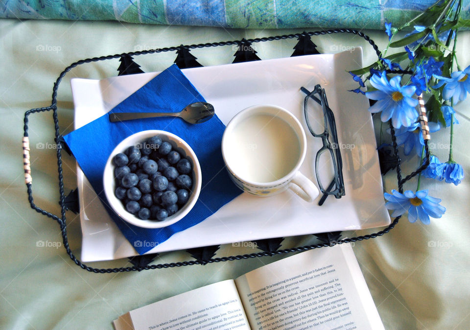 breakfast in bed, blue theme, flat lay, story, book, reading, glasses, blueberry, milk, food tray