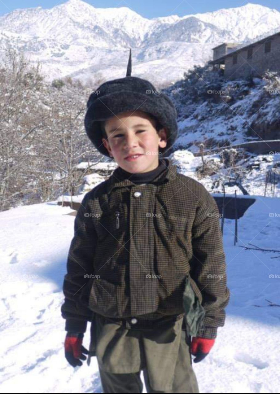 cute baby in snowfall