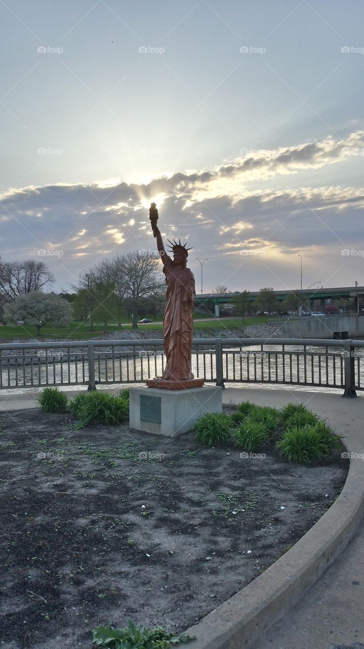 liberty at sunset. taking a walk in downtown Cedar Rapids