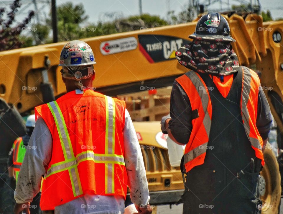 Construction Engineers. Construction workers at job site