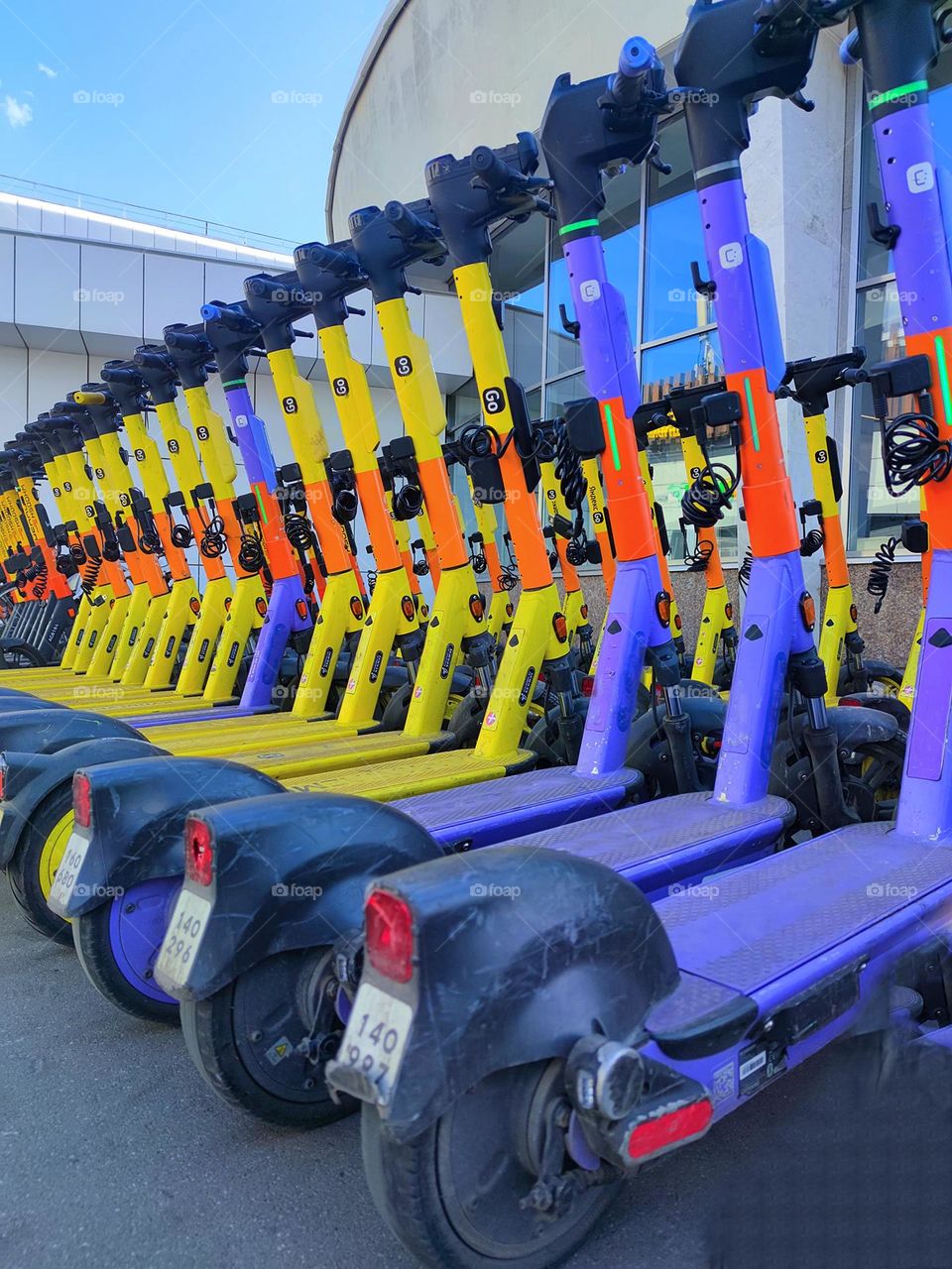 Row of electric scooters near the metro