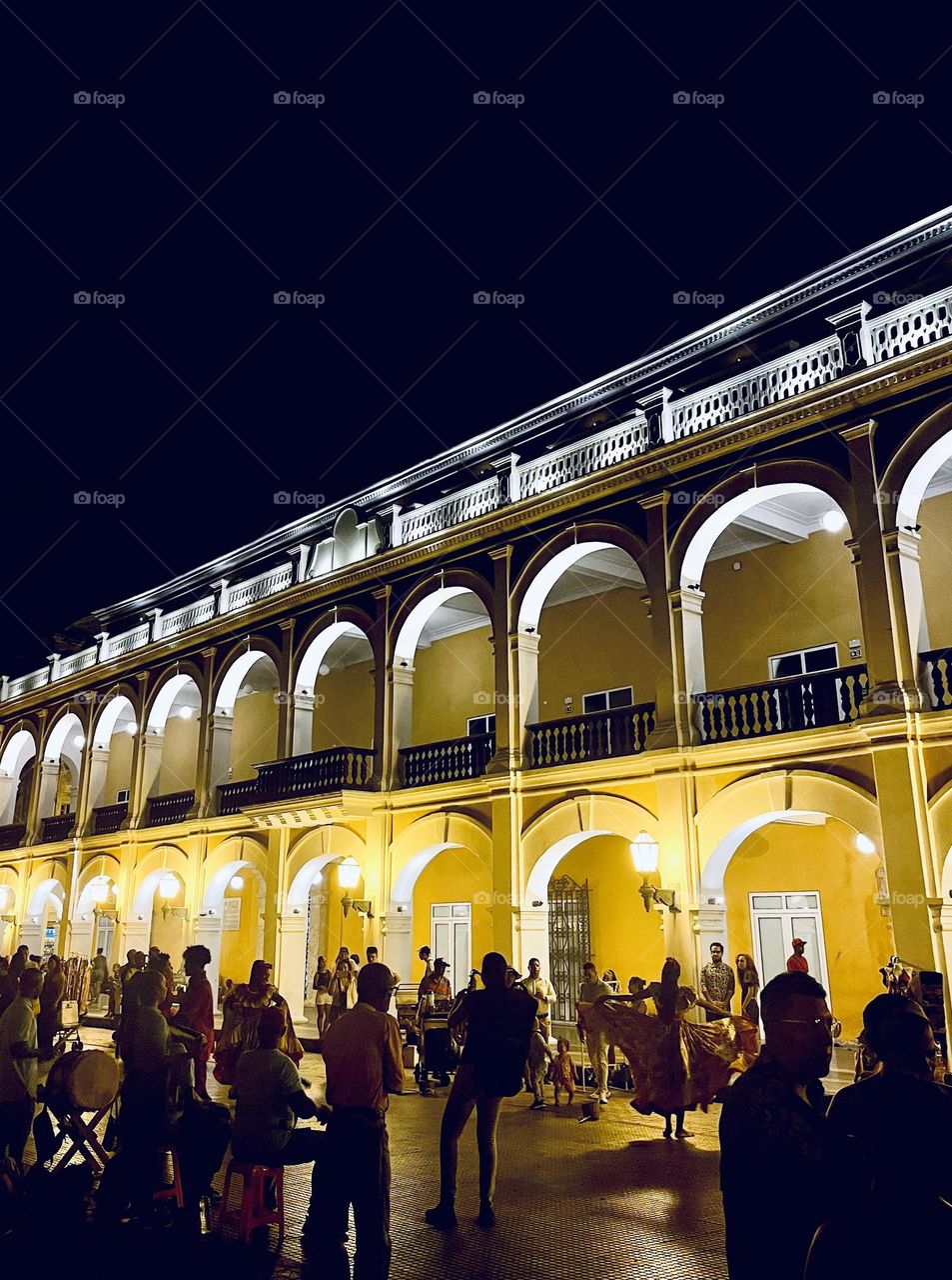 People meeting and dancing in a square in Cartagena Colombia 