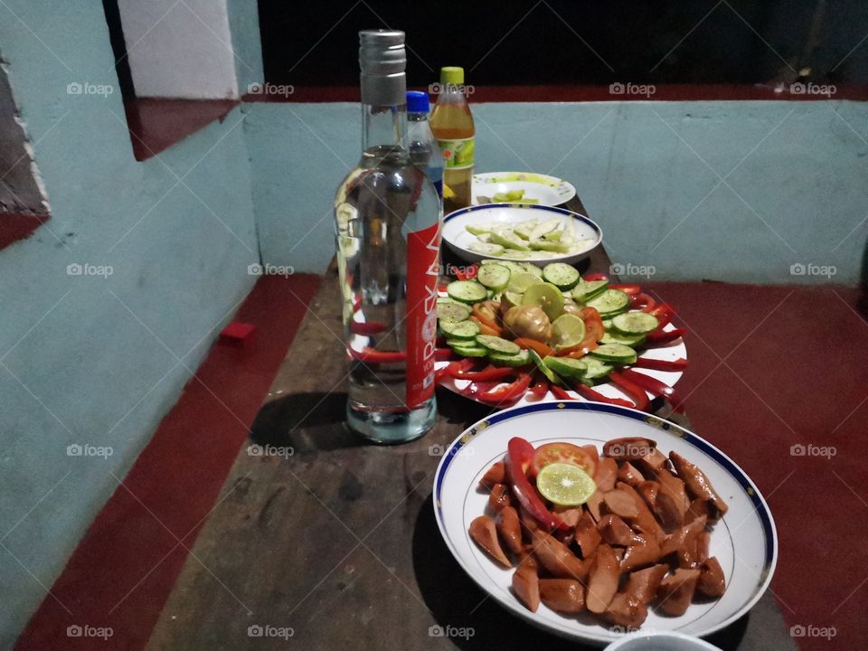 vodka+sausages +cucumber +fruits+soda+gingerele+lemon