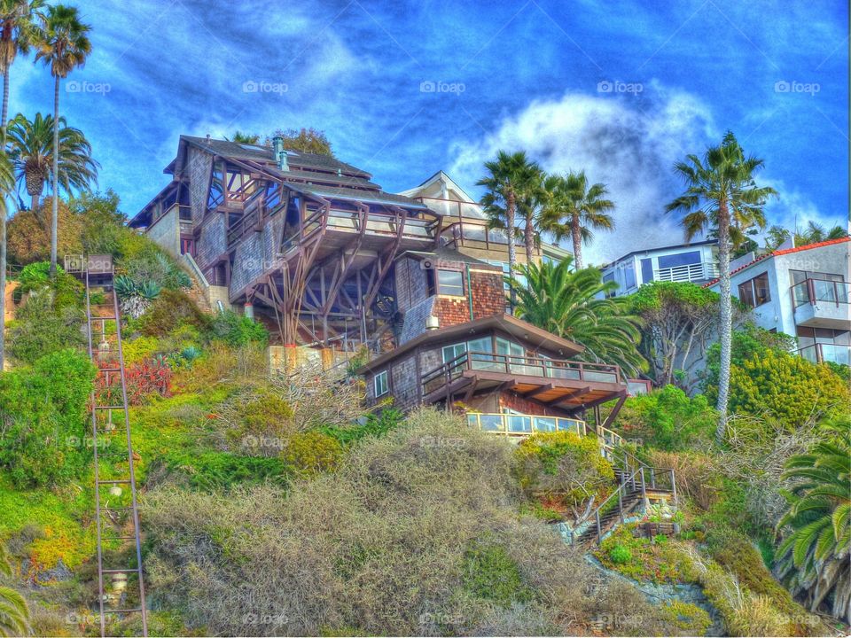An HDR image of a house on a cliff in Laguna Beach California 