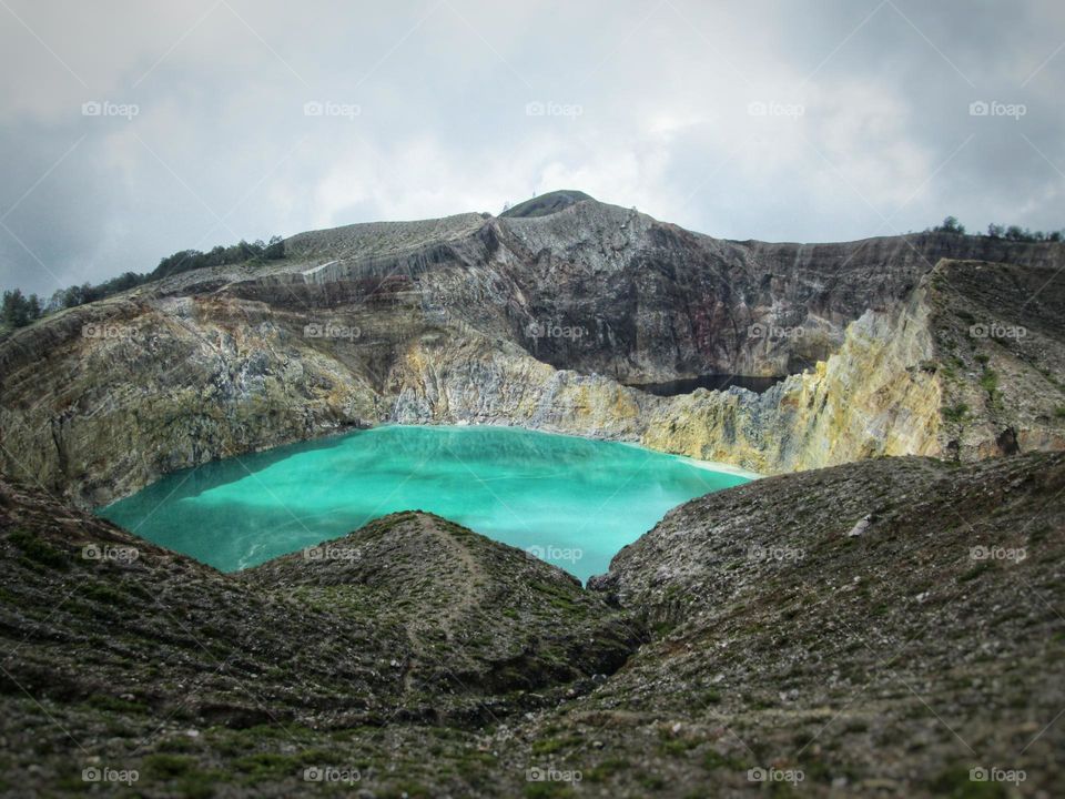 Kelimutu Lake with its green water is the extraordinary beauty of Kelimutu National Park.