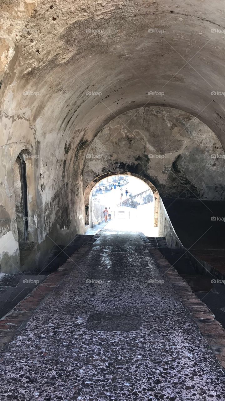 Historic castle. Castillo del Morro in Old San Juan, Puerto Rico. This tunnel was designed my Spaniards to carry cannons and artillery for combat against pirates, historic, wonder, vacationing, walking, cobalt, concrete, history, Spain, Caribbean