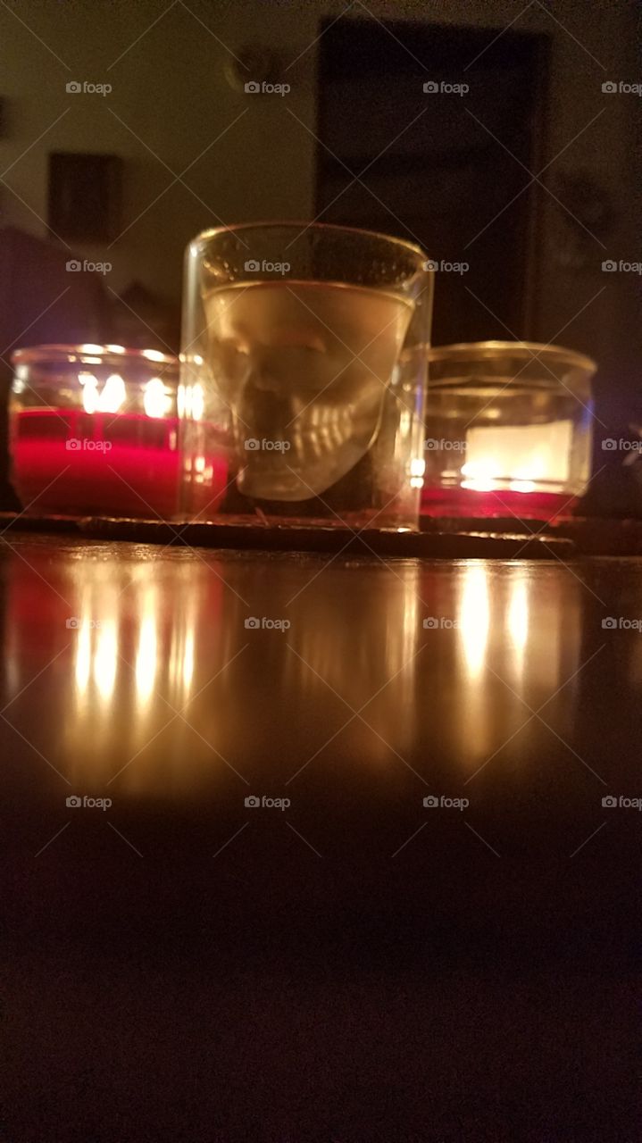skull shot glass full of peach rum