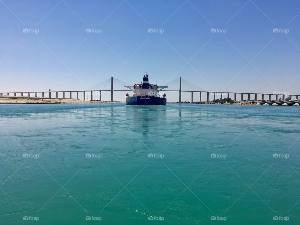 Suez Canal Ship under  Elsalam Bridge 
Egypt