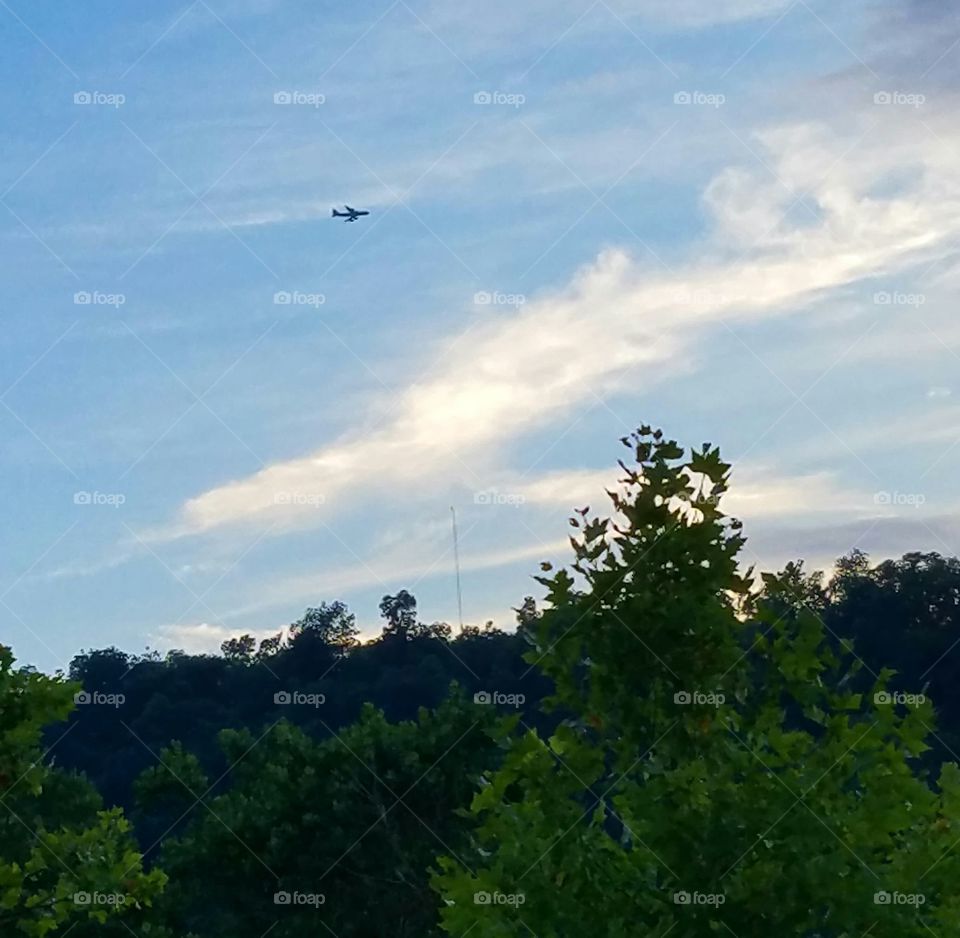 Airplane flying overhead at The Waterfront