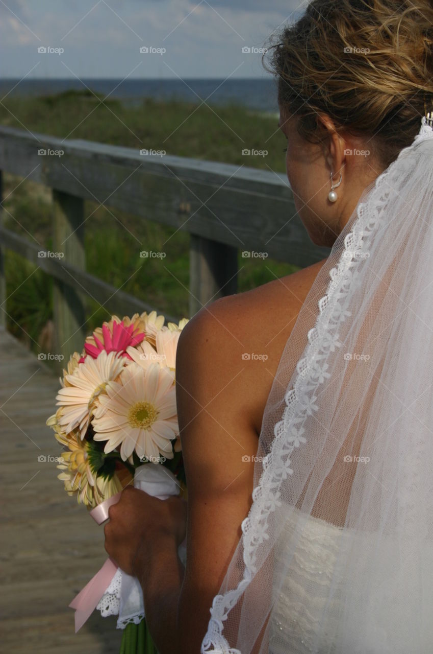 wedding flowers . the bride before walking down the aisle 