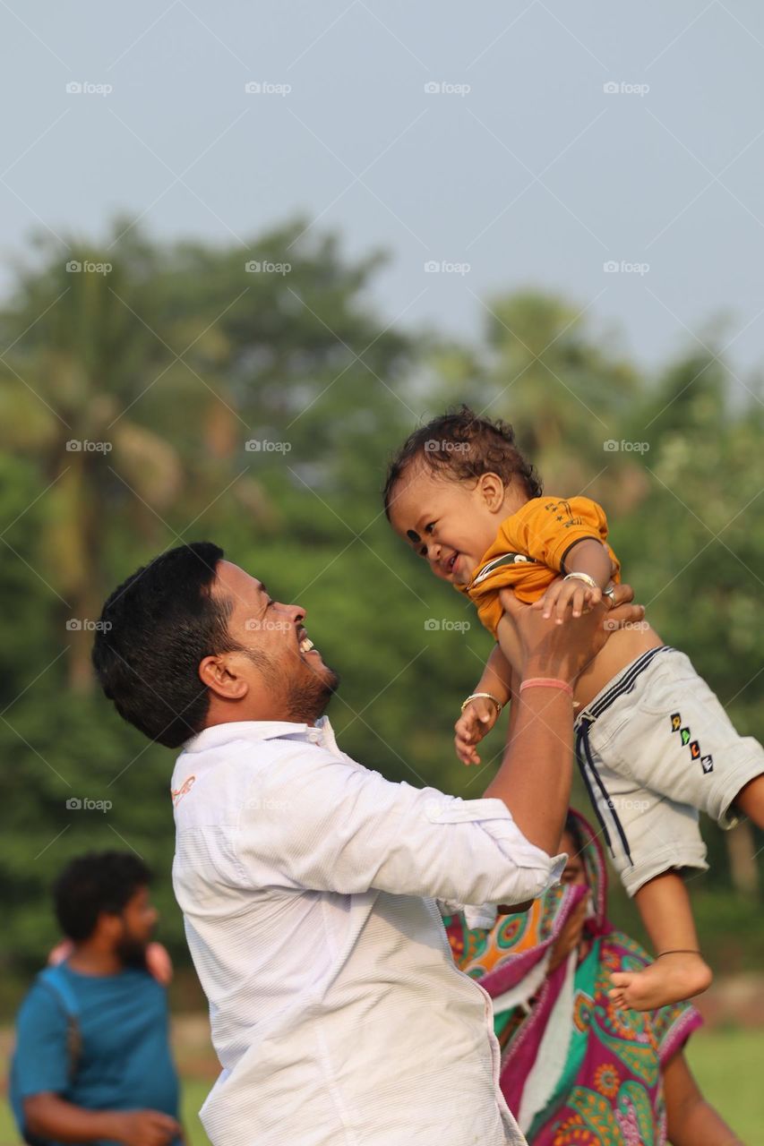 Little son enjoying time with dad