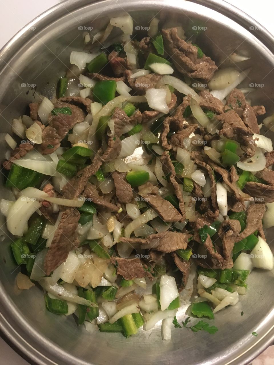 Jalapeños, steak, onions, cilantro 
