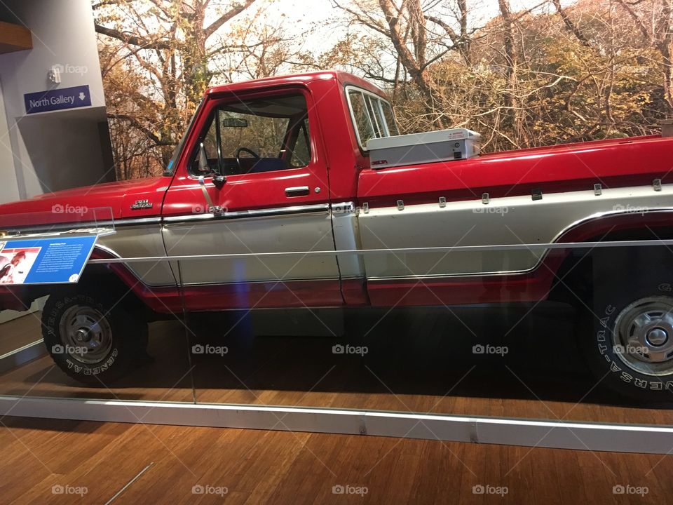 Sam Walton’s original pickup. Red and silver, shot gun in front seat tool box and dog box in the back.