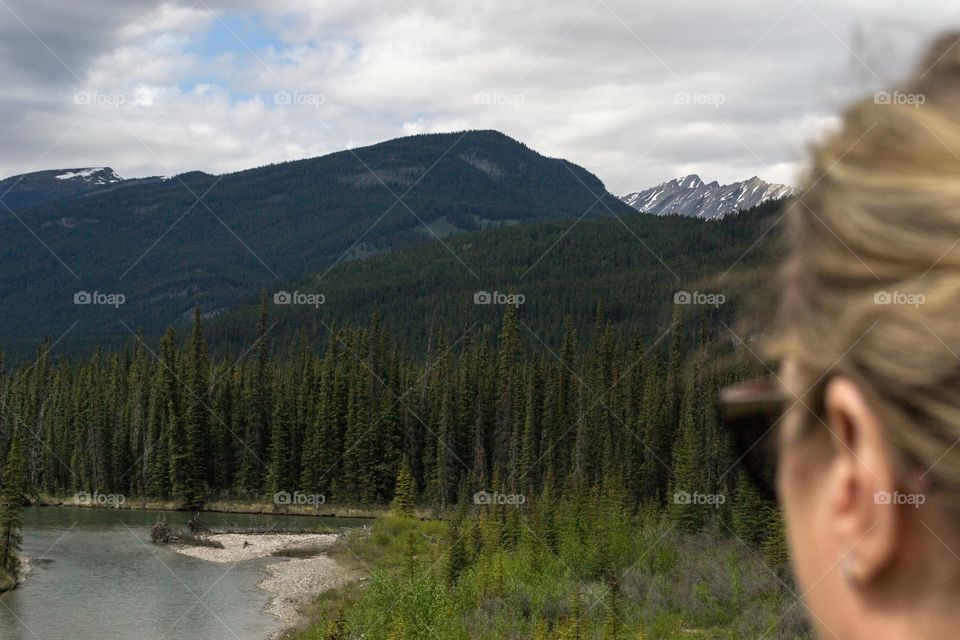 Woman Viewing Canada's Rocky Mountains near Banff Alberta 