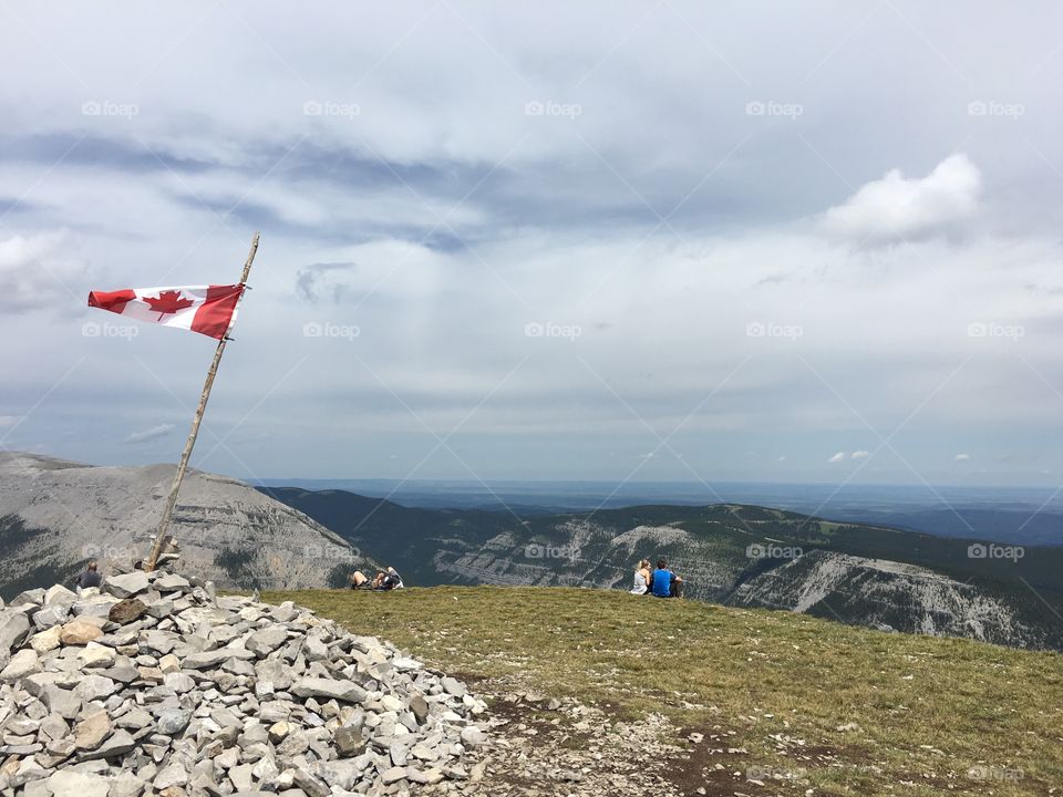 Canadian flag on mountain 