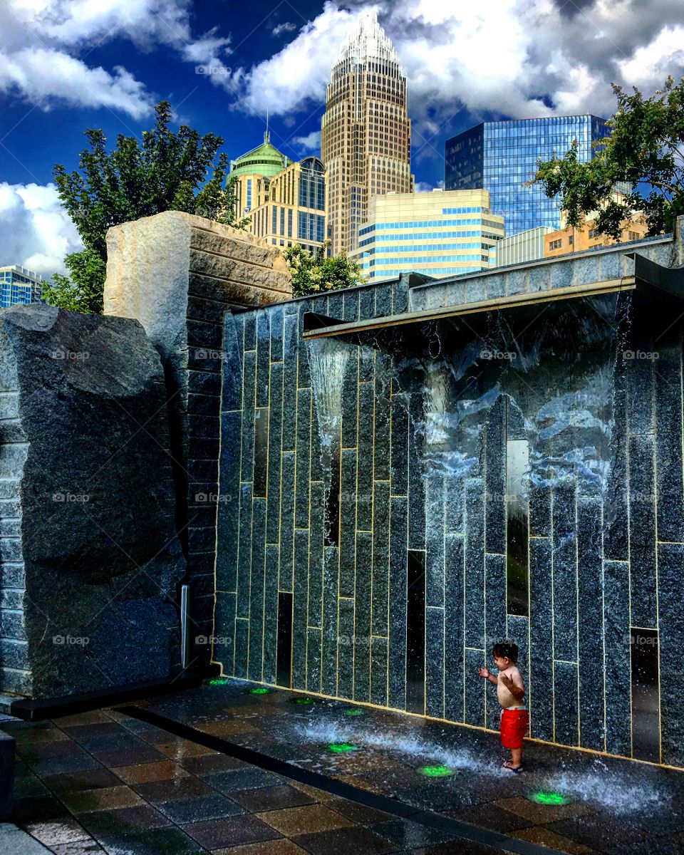 My son playing at the park in downtown Charlotte NC