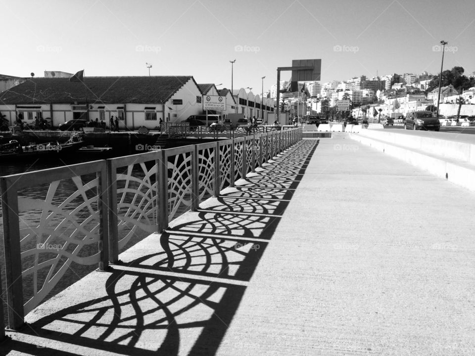 shadow of a stainless parapet on a street in Tangier, Morocco