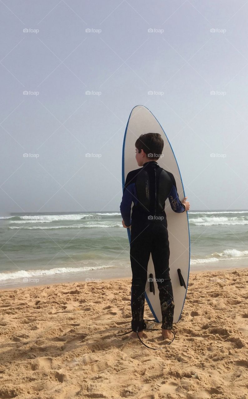 Boy with his surf board 