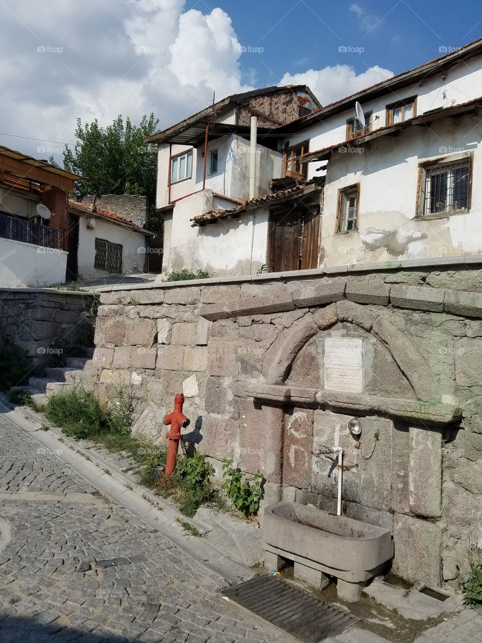ankara old fountain and street within the ankara castle in Turkey overlooking the city