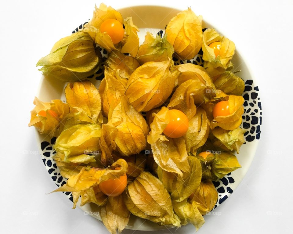 Plate of cape gooseberries, commonly referred to as physalis