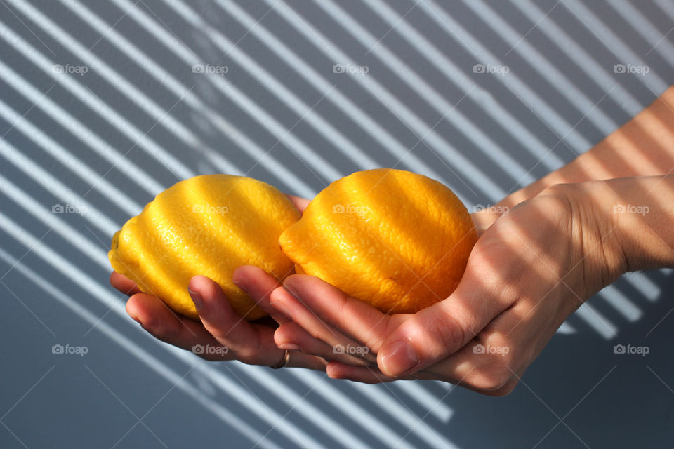 Hands, female hands, lemon in hands, lemon, fruit, food, still life, abstraction