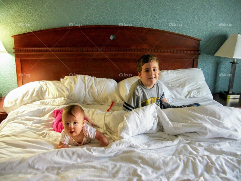 Siblings in bed