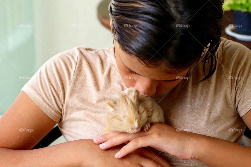 Girl and Guinea Pig 