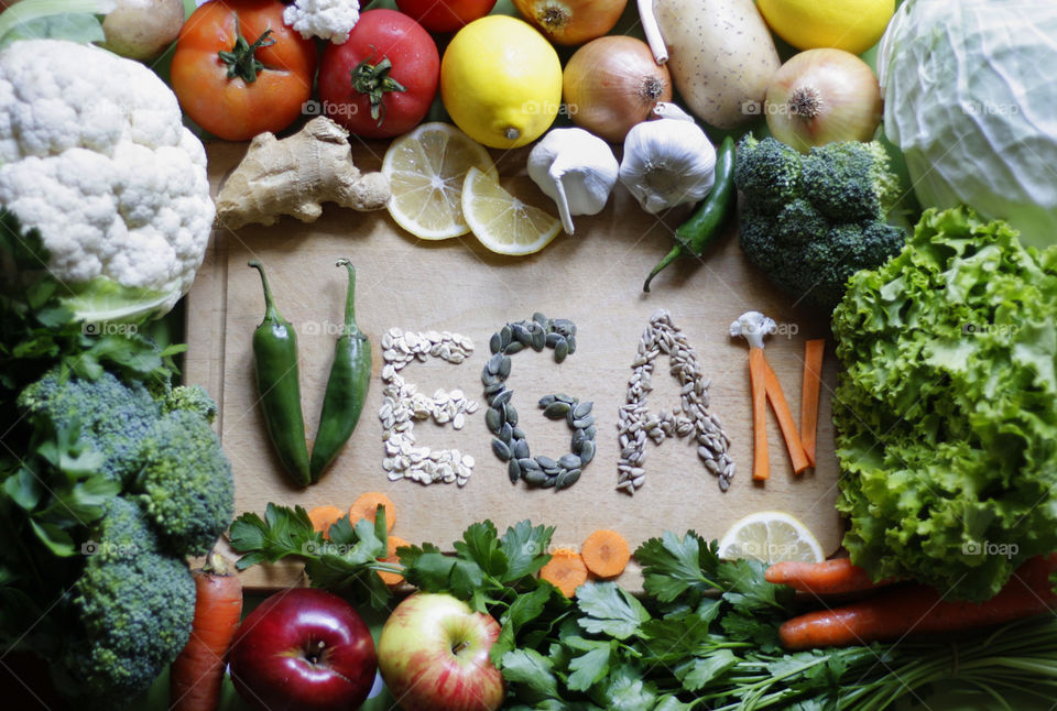 Vegetables, fruits and seeds in table, flat lay still life, cooking at home, vegan food