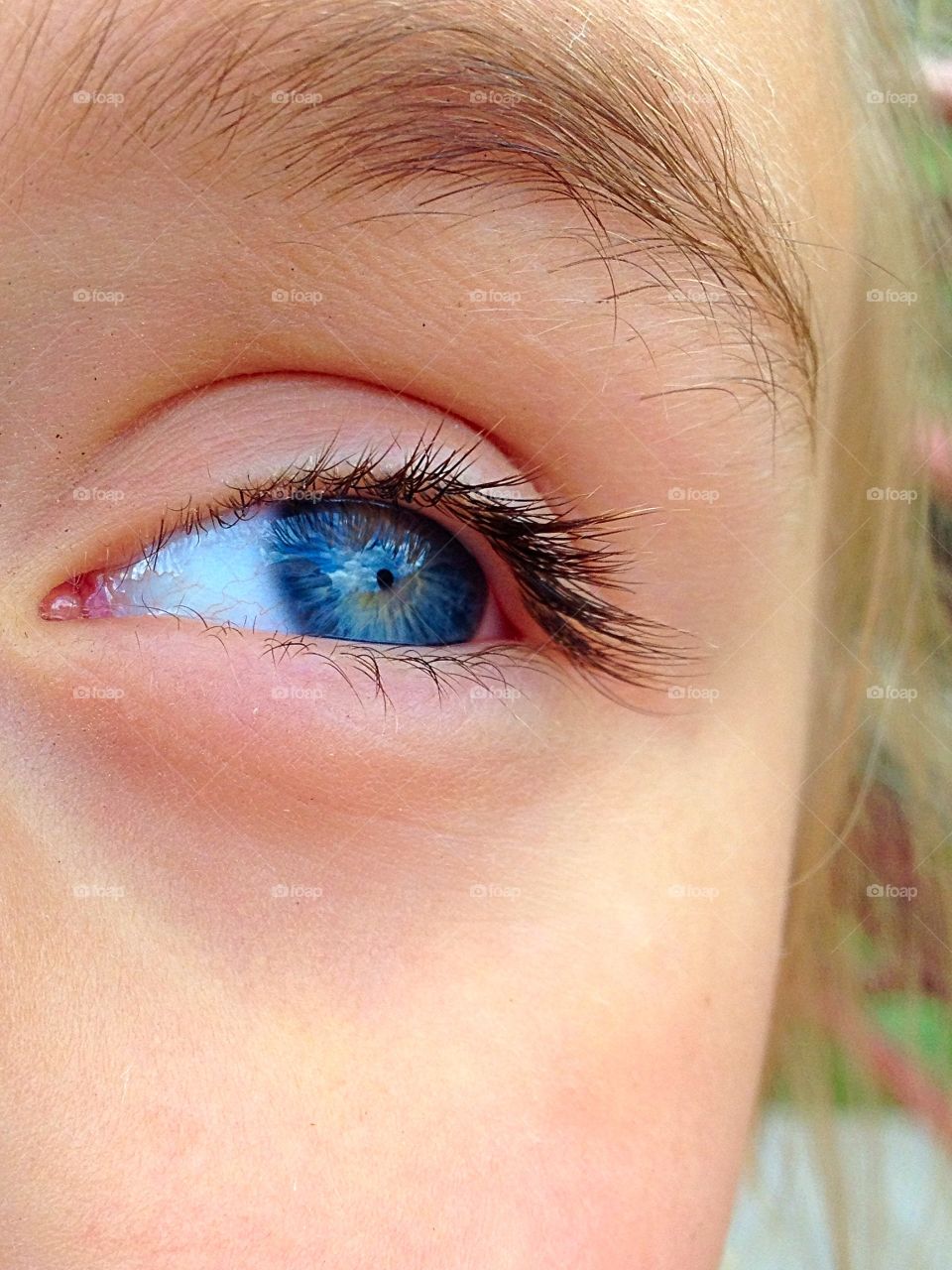 Through the Eyes of Innocence . Close up photo of my daughter's blue eyes.