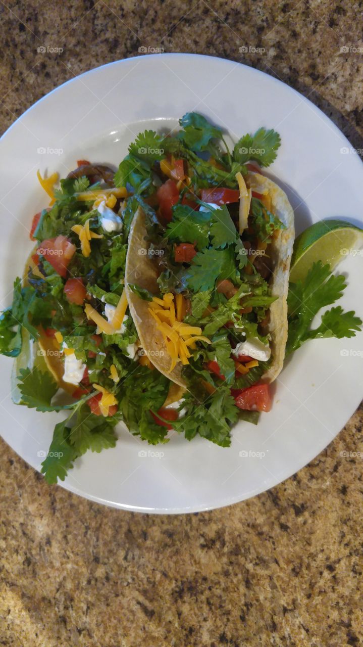 delicious flank steak tacos with spicy lime cilantro  sauce flank steak tacos